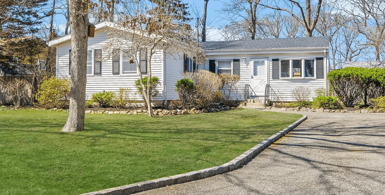 Front exterior of home after improvements in Centereach, New York