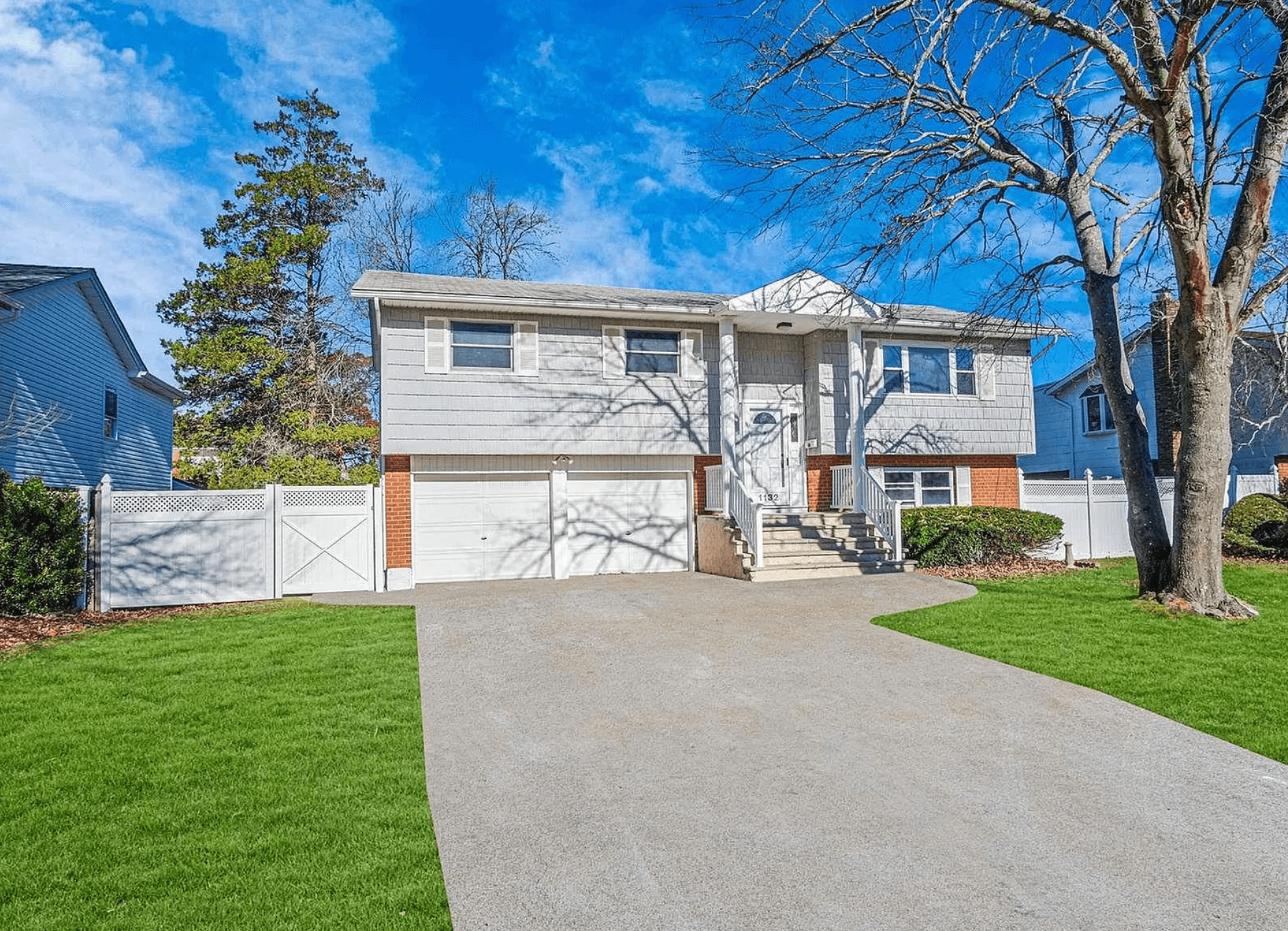 Front exterior of home after improvements in West Babylon, New York