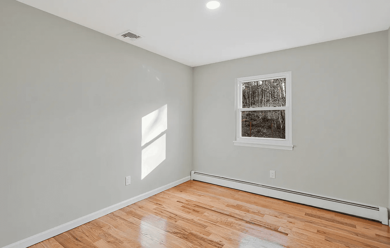 Second bedroom after renovation at 14 Clearview, Selden, NY