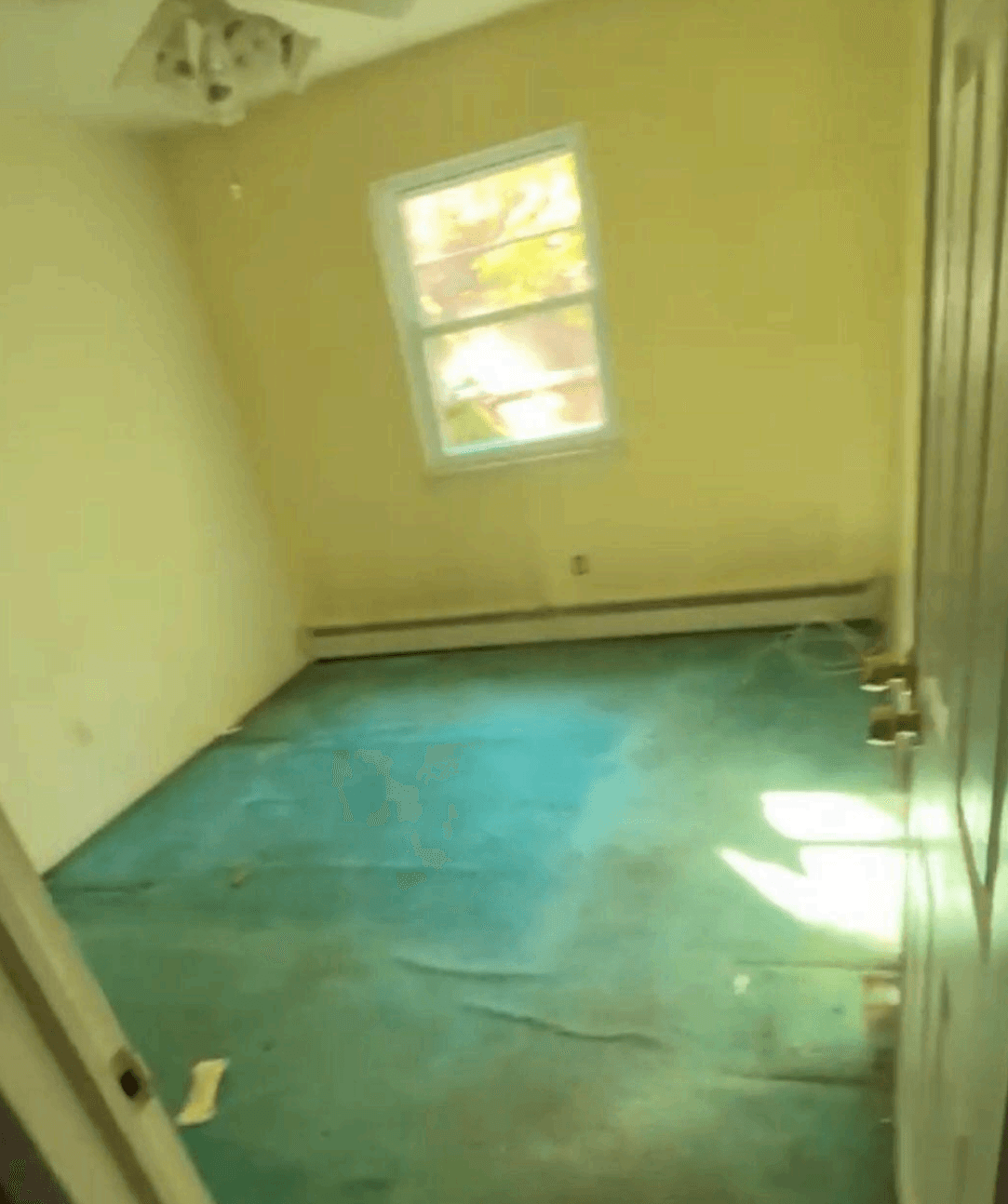 Second bedroom before renovation at 14 Clearview, Selden, NY